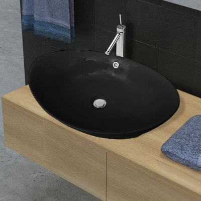Lavabo ovale en c&eacute;ramique noir avec trop plein 59 x 38,5 cm