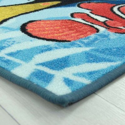 THEDECOFACTORY Tapis enfant - Nemo - bleu 50x80 cm en Polypropyl&egrave;ne