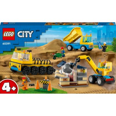 Les camions de chantier et la grue &agrave; boule de d&eacute;molition