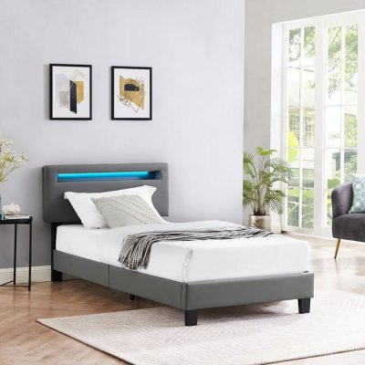 IDIMEX Lit LED simple EVAN 90x190 cm, avec sommier, rev&ecirc;tement en synth&eacute;tique gris