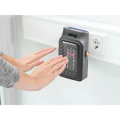 SICHLER Mini chauffage soufflant t&eacute;l&eacute;command&eacute; 500 w sur prise secteur lv-155. Rc