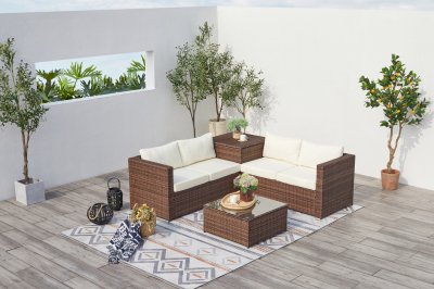 CONCEPT USINE Salon de jardin 4 places en r&eacute;sine tress&eacute;e avec coffre int&eacute;gr&eacute; marron/blanc SILANG