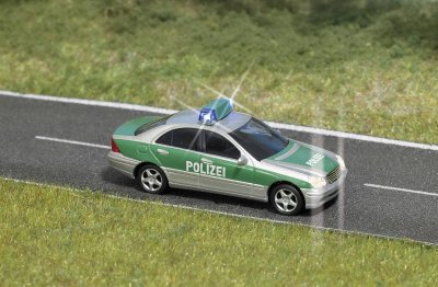 BUSCH Voiture de police classe C H0 avec clignotants 5630 Vert